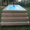 PISCINA CONTENEDOR CON REVESTIMIENTO DE MADERA
